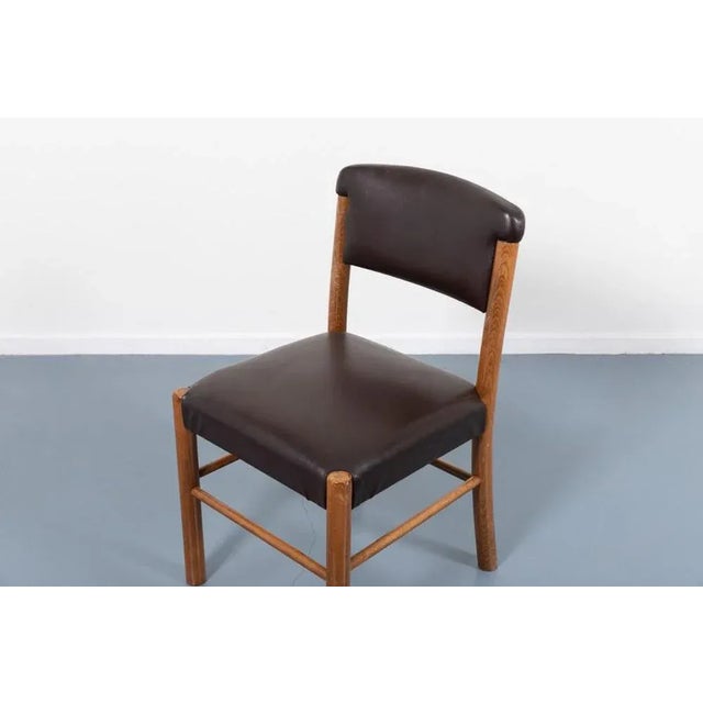 Set of four Italian modern chairs from 1960’s with varnished oak frame and brown galon upholstery. Condition Age related...