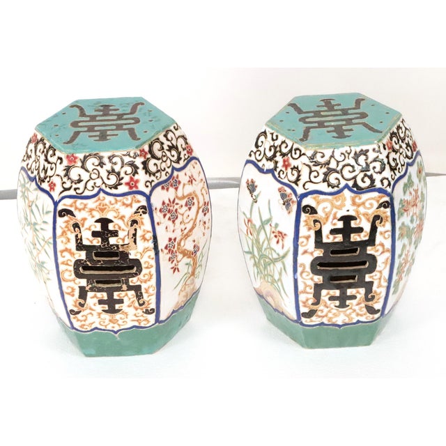 These pieces are decorated in the "Famille Rose" style, characterized by a palette of pink, green, and blue enamels. The...