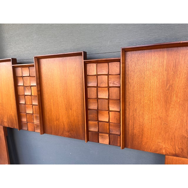 A boldly graphic Brutalist headboard by Tobago, the celebrated Canadian furniture maker whose work is collected alongside...