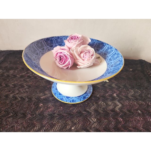 Beautiful vintage French porcelain compotier fruit stand made by Legrand in Limoges France. There is a blue pattern around...