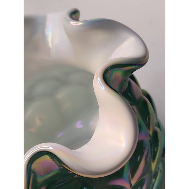 Gorgeous iridescent green Cased Glass Vase by Fenton. Signed on the bottom. In the styling of an artichoke, this rare...