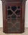 A small Georgian corner cabinet in mahogany, circa 1830.