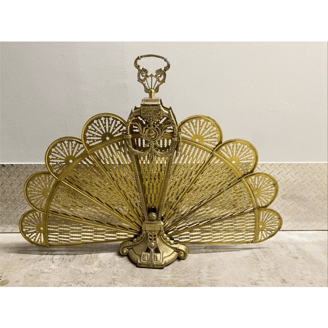 Good condition This stunning decorative piece is designed in the classic "peacock" folding fan style, making it a perfect...
