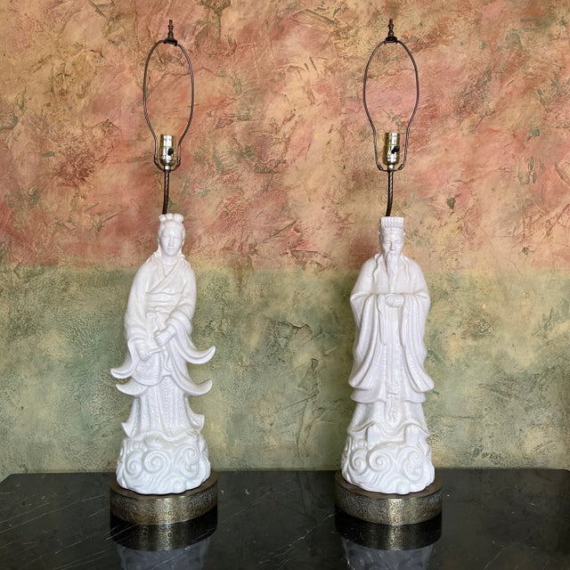 A beautiful pair of larger chinoiserie figural lamps. The lamps measure 43” tall with the shades. Without the shades up to...