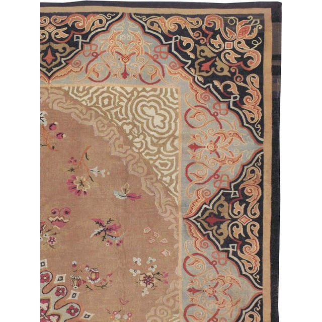 An antique flat-woven French Aubusson carpet from the turn of the 20th century. Measures: 11' 8" x 13' 6"