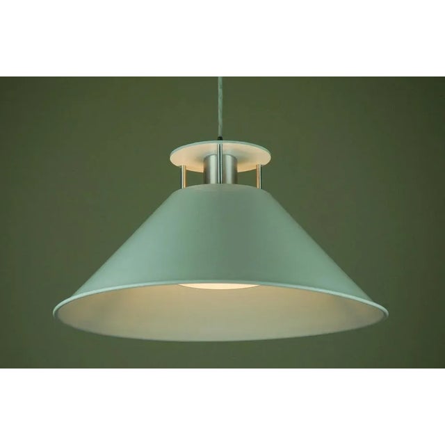 Elegant and architectural pendant lamp designed by c.f. Møller architects for nordisk solar compagni a/s, denmark. this...