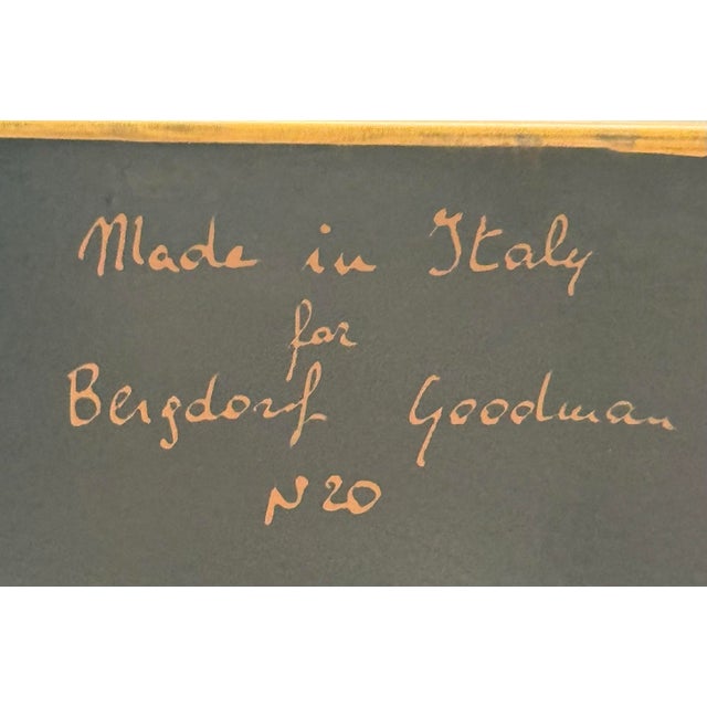 A fabulous two-piece vintage Italian tole set made expressly for Bergdorf Goodman, comprising a sculptural magazine rack...