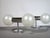 Two space-age wall lamps by Motoko Ishii for Staff Lighting, Germany, from the 1970s. Chrome-plated wall lamps with...