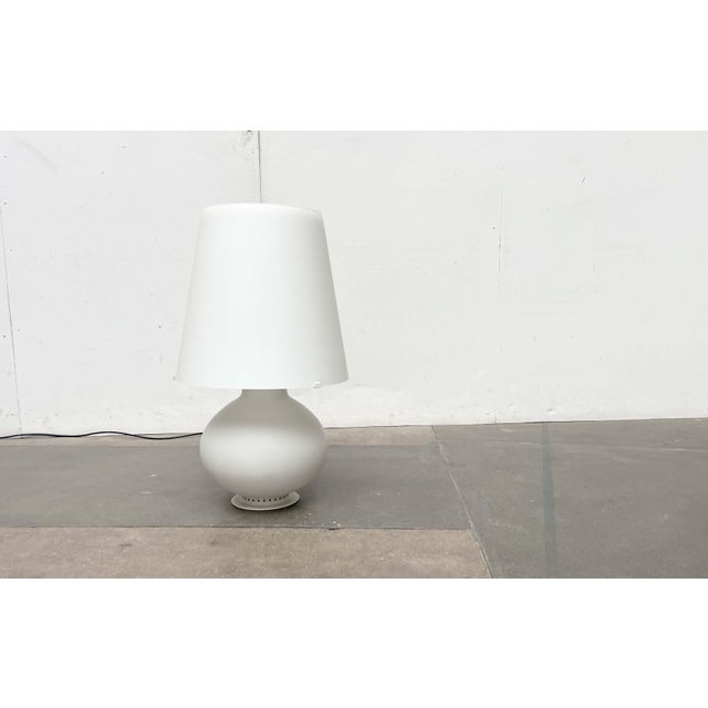 A classic of italian lighting design, based on a design by max ingrand from the 1950s. The fontana 1853 by fontana arte in...