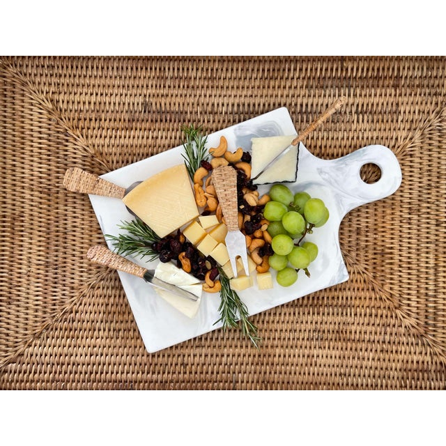 Impress your guests at your next wine and cheese party with the Rattan Stainless Steel Cheese Knives. This elegant set...