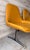 Original vintage Mid Century Modern Bench. Three seats, all connected by black metal and chrome legs. Mustard yellow vinyl...