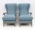 Pair of Wingback armchairs designed by Paolo Buffa and produced by Framar in the 1950s. The armchairs have been restored...