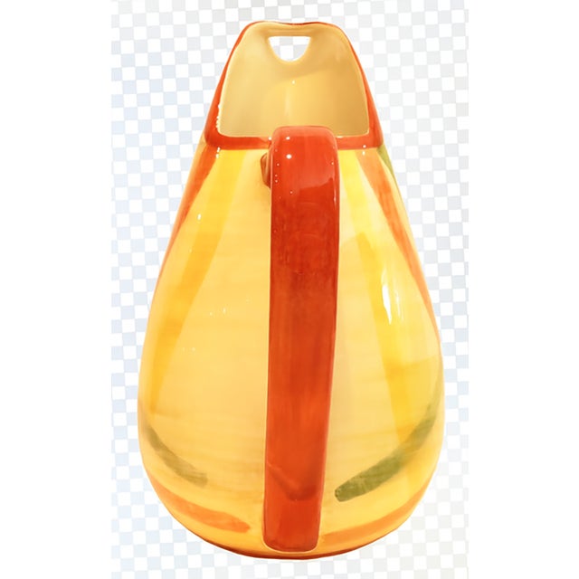 Striking Vernon Kilns' classic California pottery pitcher in the Homespun / Plaid / Organdie-pattern. Generously...