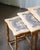 A set of three Danish oak and tile nesting tables designed by Henning Kjærnulf and tiles by Edmund Pedersen — a pairing...