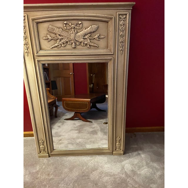 This exquisite Kindle Trumea French Revival mirror is a timeless treasure, radiating an aura of cherished elegance and...