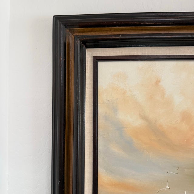 Bring the beauty of the coast into your home with this original signed vintage oil painting featuring a weathered...