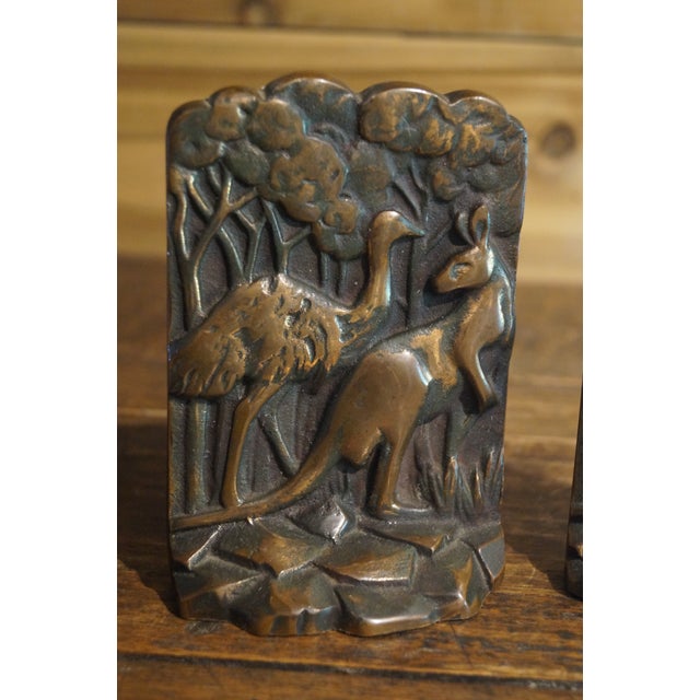 A very old pair of copper bookends which feature kangaroo and emu. These bookends come from the estate of a Free Mason who...