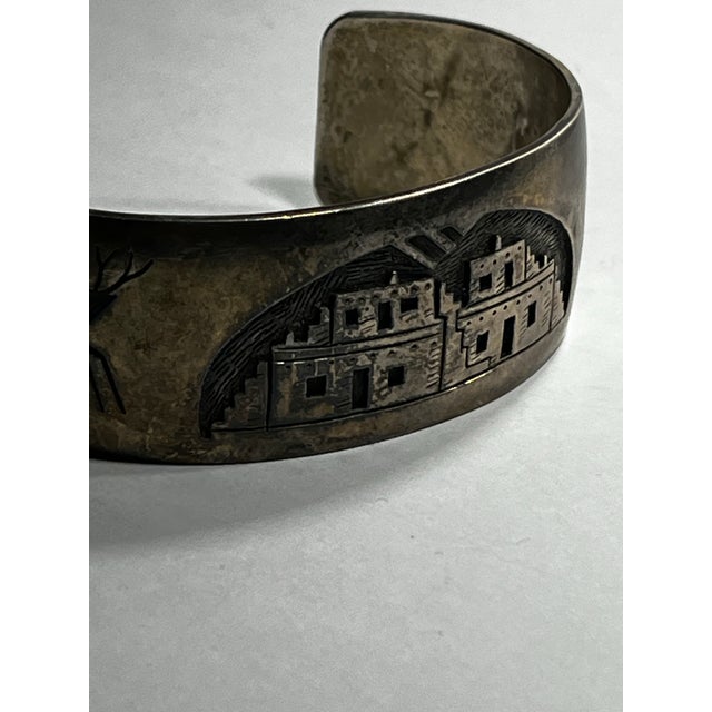 An extremely rare Hopi vintage overlay cuff sterling silver Measures 5 1/2 inches interior with a one and 3/4 inch gap for...