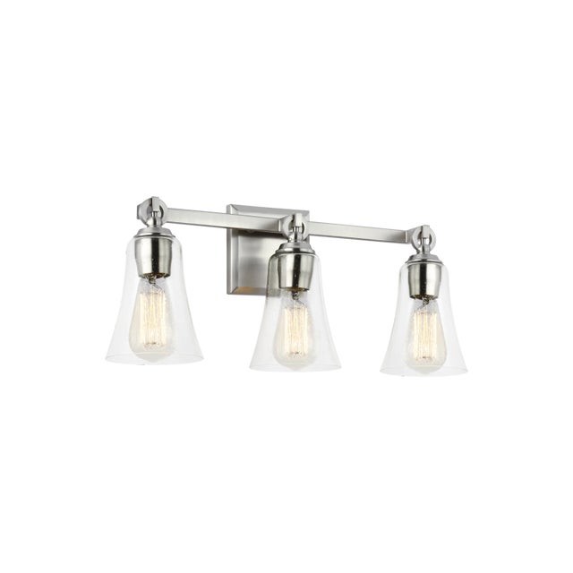 The Monterro three light vanity fixture in satin nickel offers shadow-free lighting in your powder room, spa, or master...