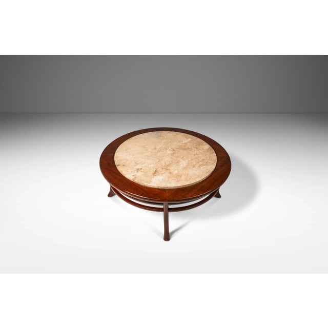 Introducing an extraordinary coffee table attributed to the late great T.H. Robsjohn-Gibbings. Constructed from a frame of...