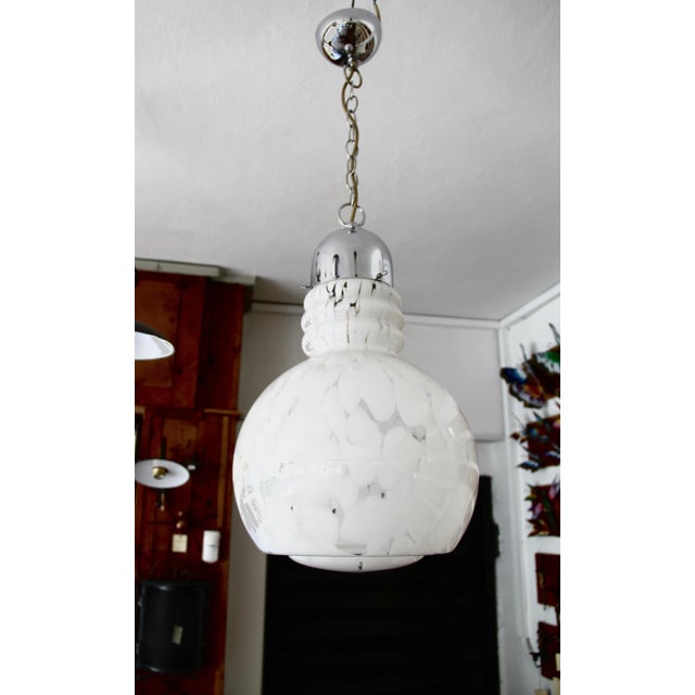 This is a mouth blown Murano glass ceiling lamp in the Space Age style. It measures 90cm including the cable and shade but...