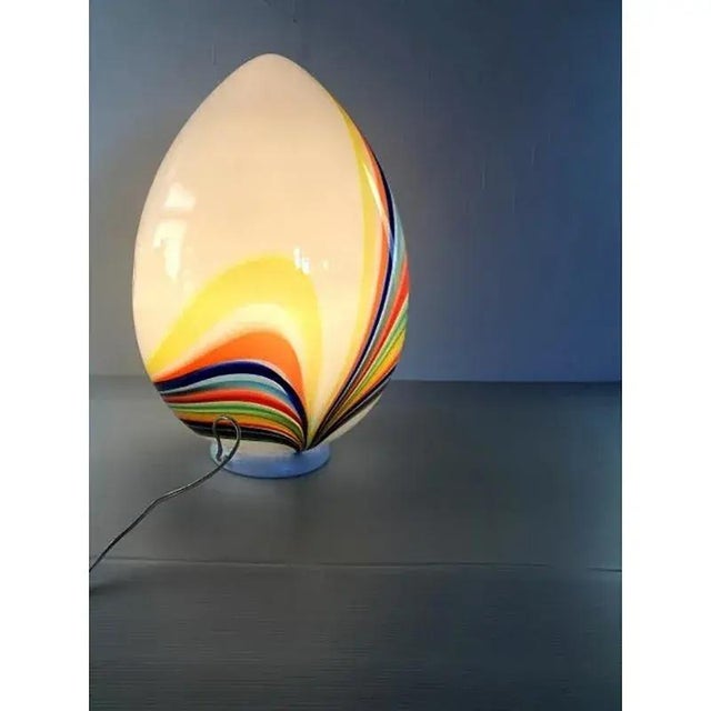 White egg lamp in murano glass with multicolored reeds fused together. glass rods create spectacular and scenographic...