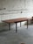 Beautiful vintage Scandinavian Modern extension dining table crafted in warm teak in Denmark. This elegant Mid-Century...