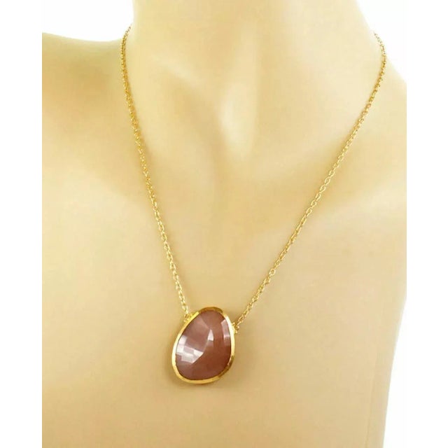 Brand: Gurhan Hallmark: Gurhan 0.990 NA0y432 Gemstone: peach color moonstone (25mm long x 17.5mm wide) Material: 24k gold...