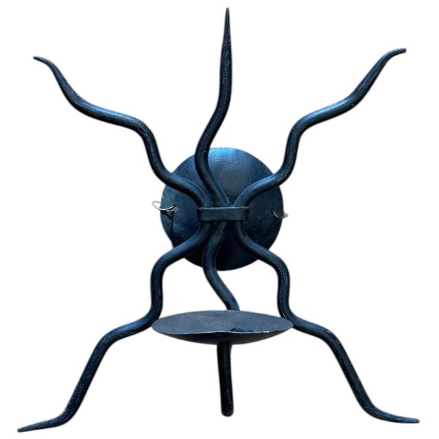 Intriguing and sexy, this vintage wrought iron wall sconce adds instant character to your home. We love this in a cozy...