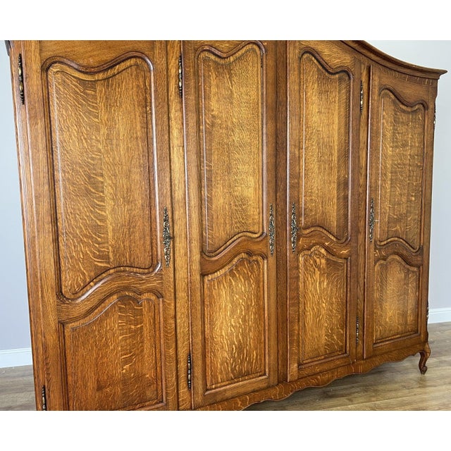 Brown Vintage French Louis XVI Style Carved Oak 4-Door Armoire For Sale - Image 8 of 11