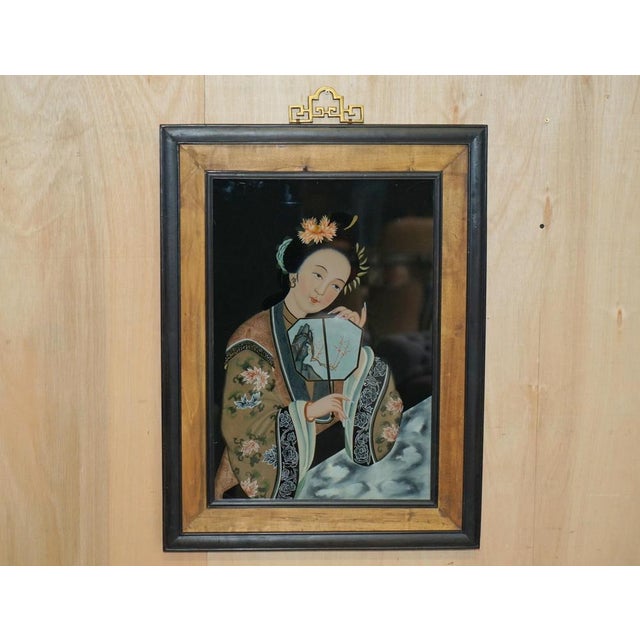 Lovely pair of Antique Chinese Ancestral Portraits which have been hand reverse painted on to the back of glass A very...