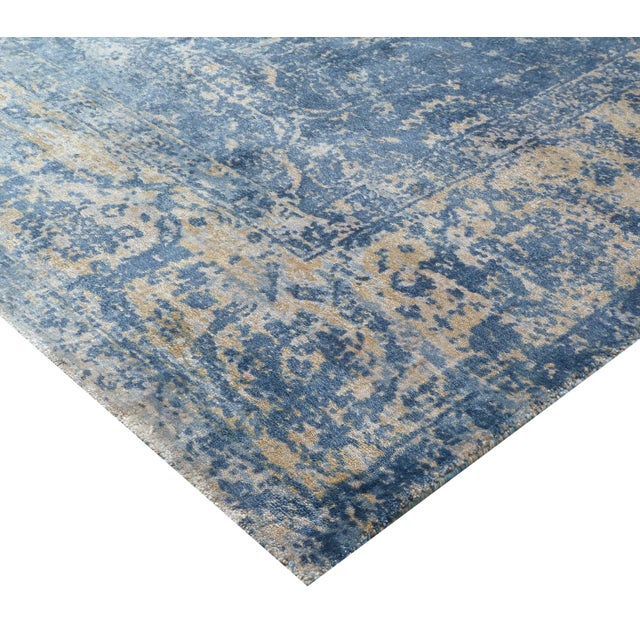 Unique splashes of color guide the eye through the Newport rug's spontaneous design. Handmade from the richest New Zealand...