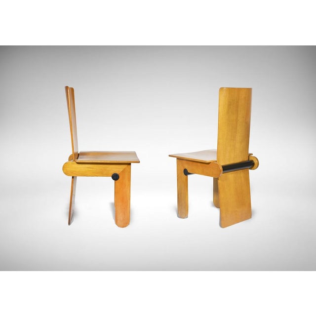 Two vintage oak wood chairs by Carlo Scarpa for Gavina. Italy 1974. Excellent condition. This piece is attributed to the...