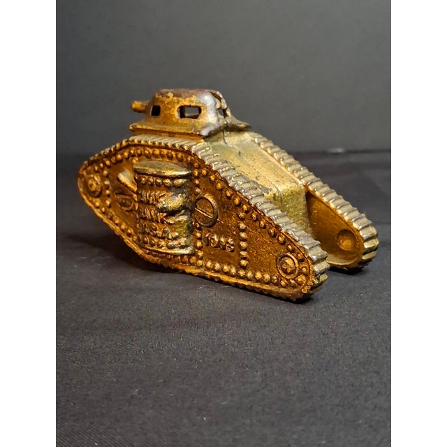 Up for sale is an authentic, original WWI-era cast iron "Tank Bank U.S.A. 1918" still penny bank made by the A.C. Williams...