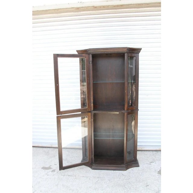 Regency China Display Cabinet by Philip Reinisch A tall elegant glass display cabinet by Reinisch CO, Circa 1970s....