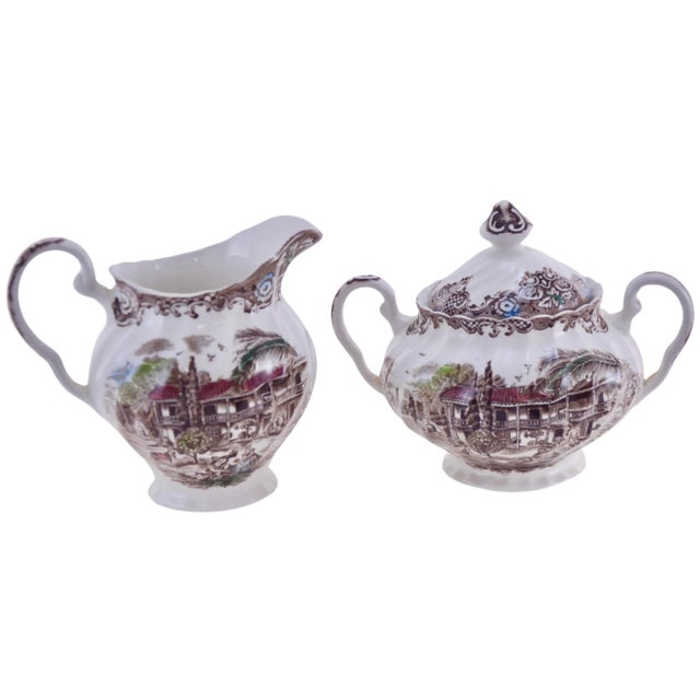 Heritage Hall multi-color transferware pattern cream pitcher and lidded sugar bowl in brown, red, blue and green made by...