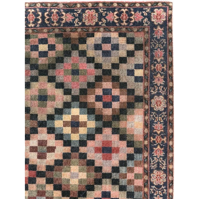 This mid-20th-century Turkish Anatolian wide gallery runner presents a vibrant field of small, multicolored squares...