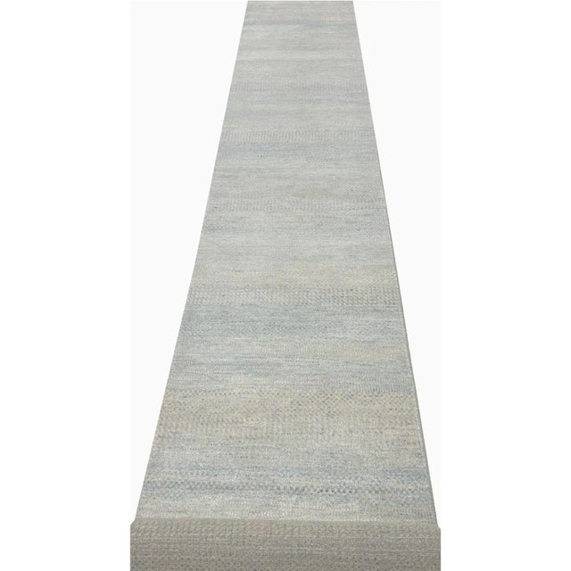 Exact Size: 2'5" x 15'10" Color: Natural Age: New Materials: Wool, Bamboo Silk Construction: Hand Knotted Origin: India