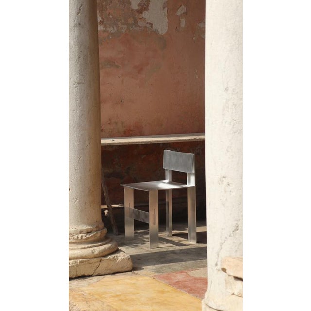 Soft futurism al chair in aluminum and stainless steel by filippo andrighetto. Dimensions: w 43 x d 43 x h 70 cm....