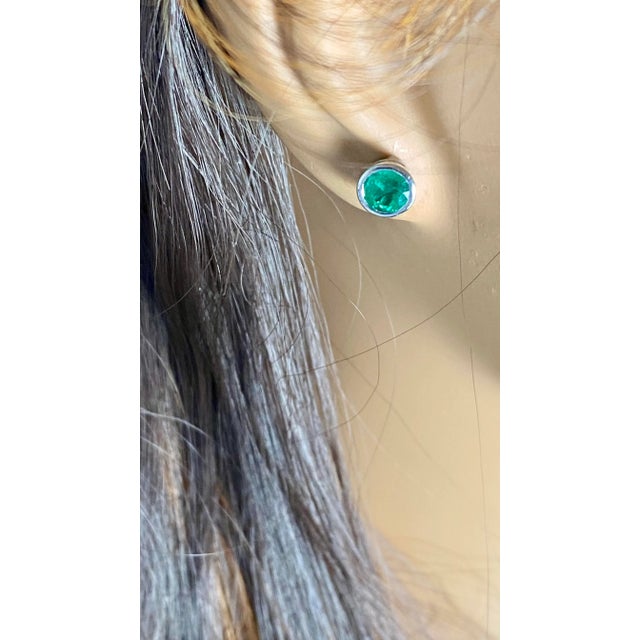 Metal 14 Karat White Gold Bezel-Set Pair Round Emerald 0.70 Carat Screw Back Earrings - 2 Pieces For Sale - Image 7 of 8
