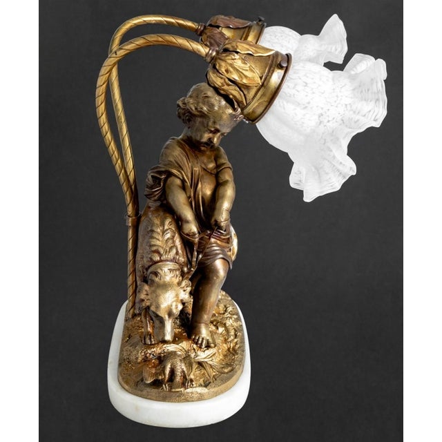 After Auguste Joseph Peiffer (French, 1832-1886) Patinated Bronze Figural Two Branch Table Lamp, late 19th century,...