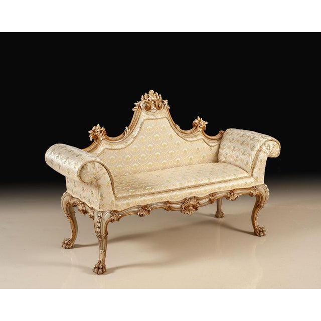 An original Italian antique, this upholstered bench retains its hand-painted ivory finish with softly aged gold leaf...