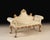 An original Italian antique, this upholstered bench retains its hand-painted ivory finish with softly aged gold leaf...