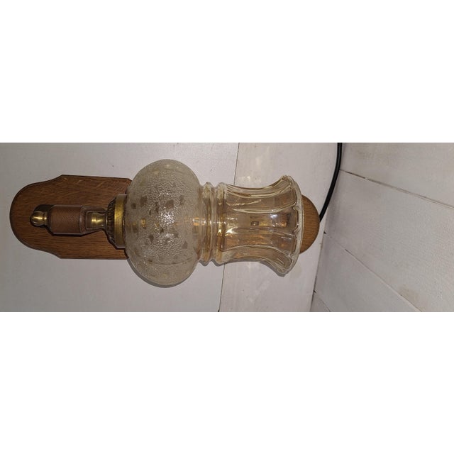 German Rustic Oak Wall Lamp with Brass Mounting and Lightly Tinted Glass Shade from Wortmann & Fitz, 1980s, in Very Good...