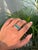 This Half Eternity Band ring features a 2.91 carat pear-cut emeralds set in 14K white gold. Each measuring approximately 6...