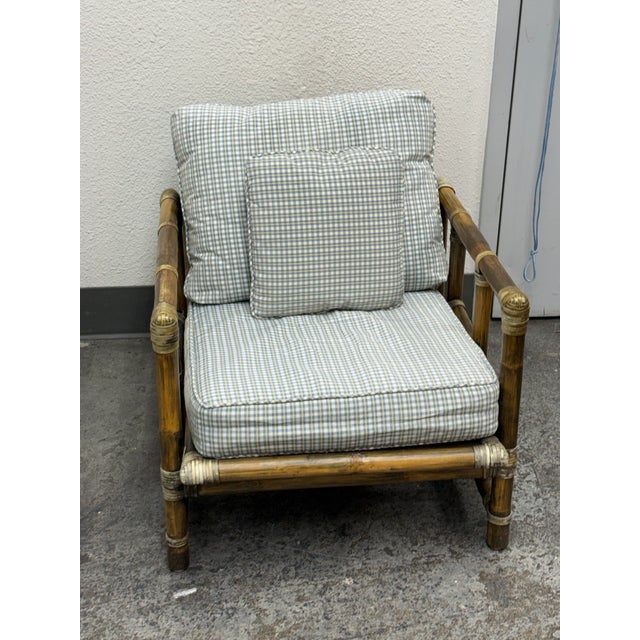 Design Plus Gallery presents a Pair of Circa 1970’s Bamboo Club Chair from McGuire Furniture. This chair showcases the...