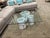 Make a sophisticated statement with this stunning Carrara Marble Base Coffee Table, featuring a sleek, clear glass top...