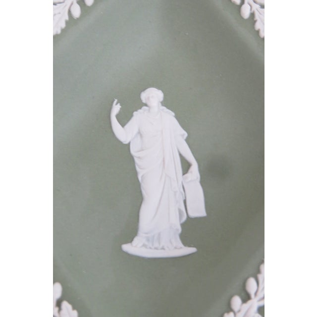 This beautiful Matte Trinket Dish is made of ceramic pottery. This lovely piece features a diamond shape and is stamped on...