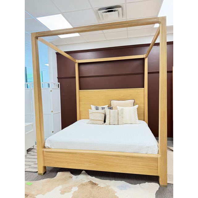 An impressive classic king canopy bed combines sleek lines in warm French oak. Paired with inlaid matte brass throughout...