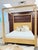 An impressive classic king canopy bed combines sleek lines in warm French oak. Paired with inlaid matte brass throughout...